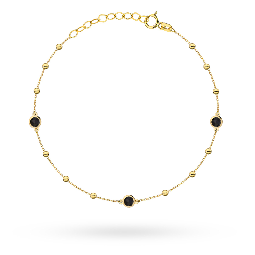Bransoletka złota z gładkimi kuleczkami i czarnymi kamieniami