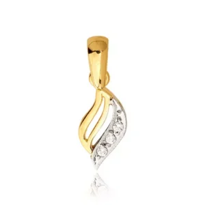 Złoty wisiorek jako elegancki dodatek.