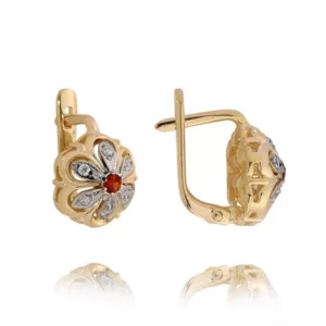 Eleganckie kolczyki ze złota z subtelnym blaskiem kamieni.