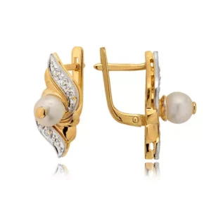 Klasyczne kolczyki ze złota z dekoracyjnym kamieniem.