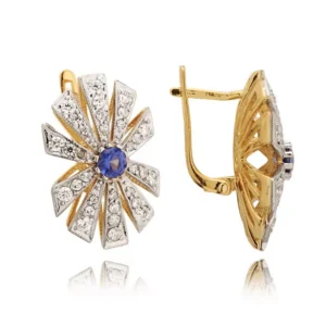 Eleganckie kolczyki ze złota z subtelnym blaskiem kamieni.