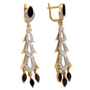 Złote kolczyki łączące elegancję i nowoczesny design.