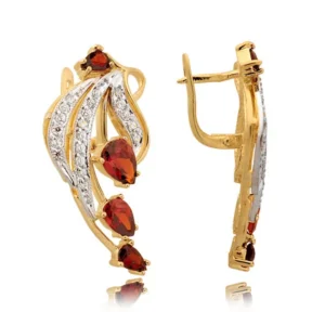 Klasyczne kolczyki ze złota z dekoracyjnym kamieniem.