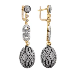 Klasyczne kolczyki ze złota z dekoracyjnym kamieniem.