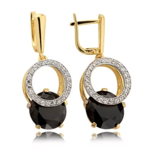 Złote kolczyki łączące elegancję i nowoczesny design.