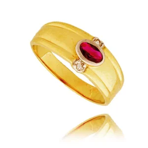 Złoty pierścionek podkreślający subtelny blask kamieni.