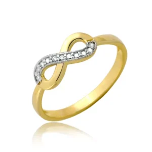 Złoty pierścionek podkreślający subtelny blask kamieni.