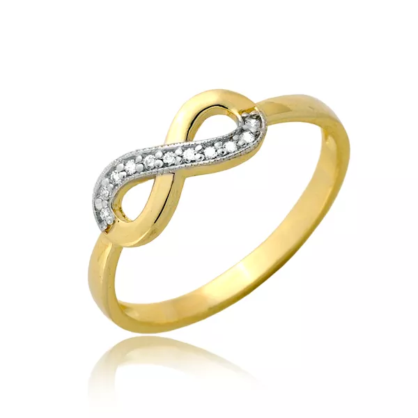 Złoty pierścionek podkreślający subtelny blask kamieni.