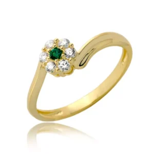 Złoty pierścionek podkreślający subtelny blask kamieni.