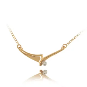 Złoty wisiorek tworzony specjalnie na zamówienie.